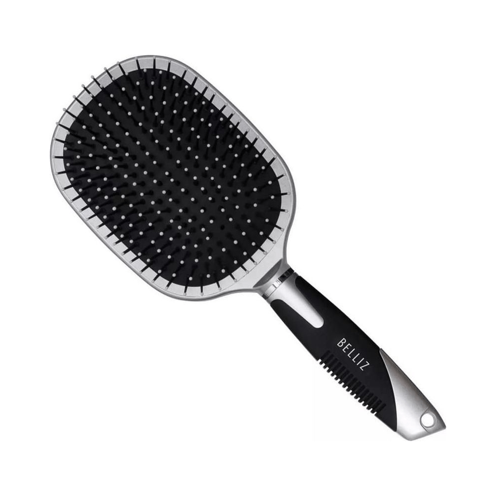 Escova Belliz Racket vista em ângulo sobre fundo branco destacando cabo e cerdas