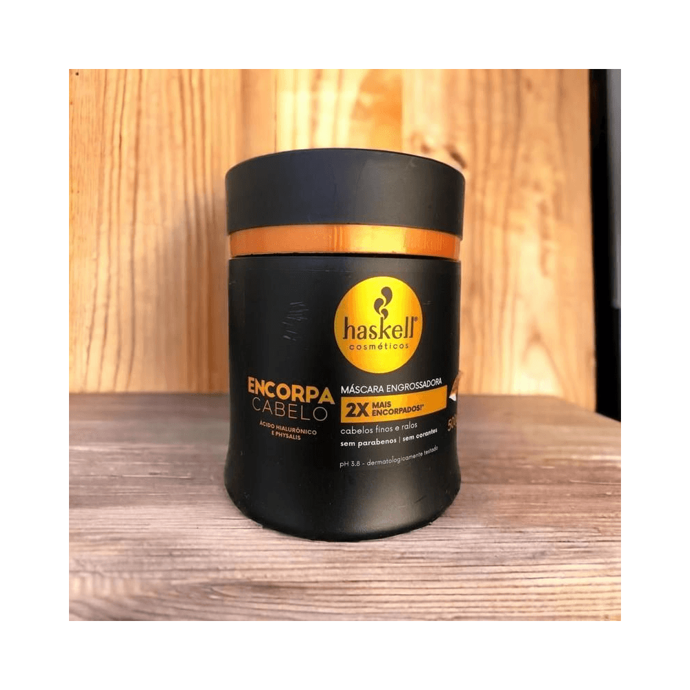 Pote preto fosco Haskell Encorpa Cabelo 500g sobre superfície de madeira
